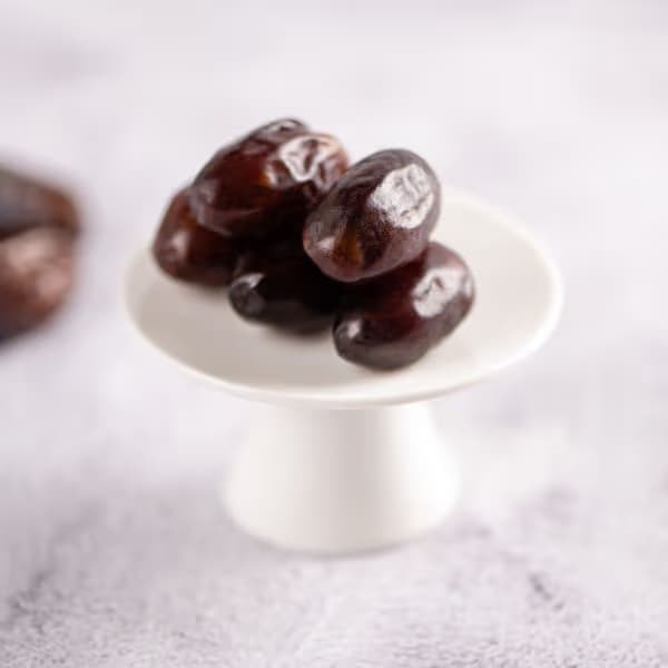 Fresh Lulu dates at the rottab stage from The Date Room's Al Ain farms — pale gold, soft, and honey-sweet