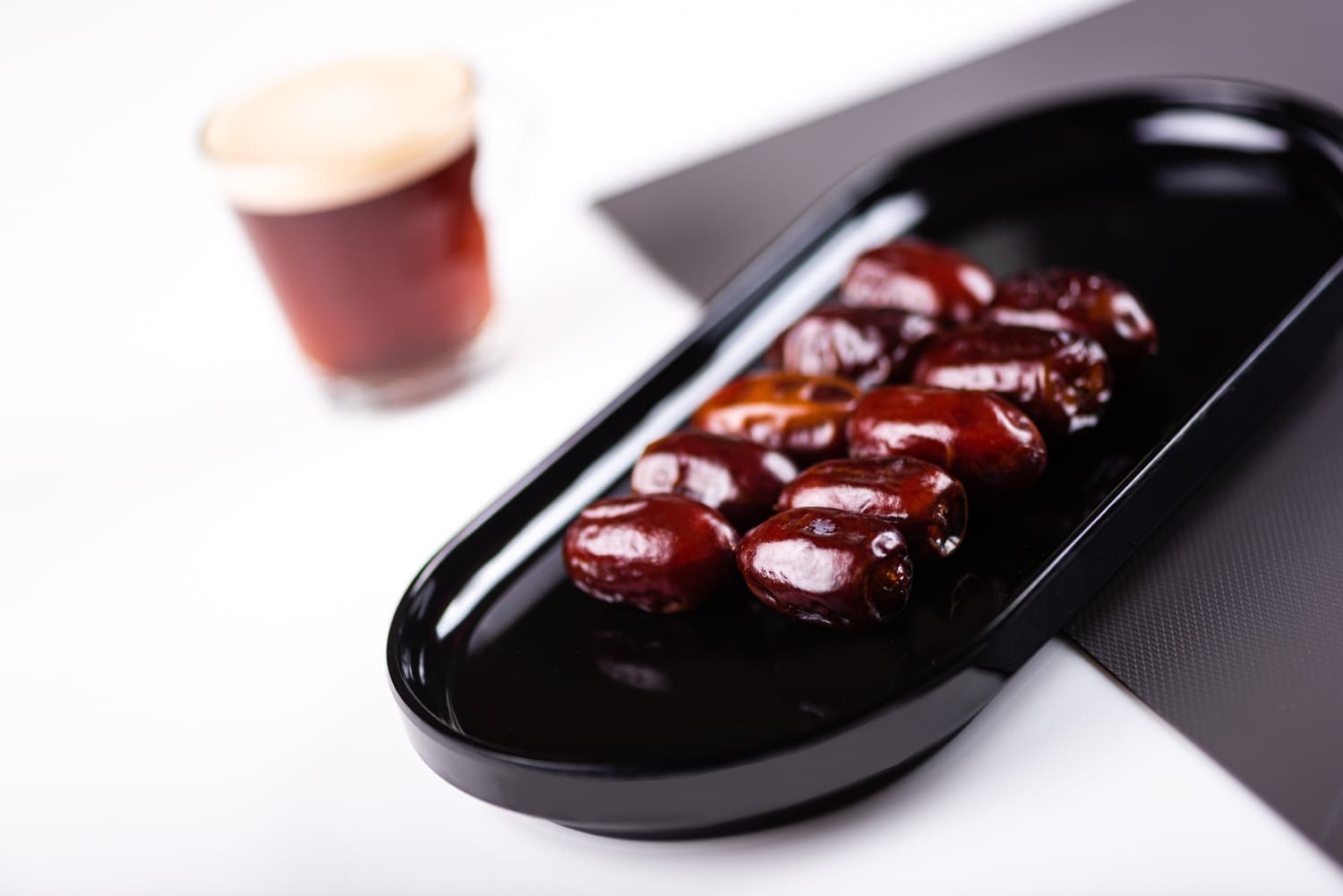 Khalas, Fard, and Lulu dates arranged side by side — three premium UAE varieties compared
